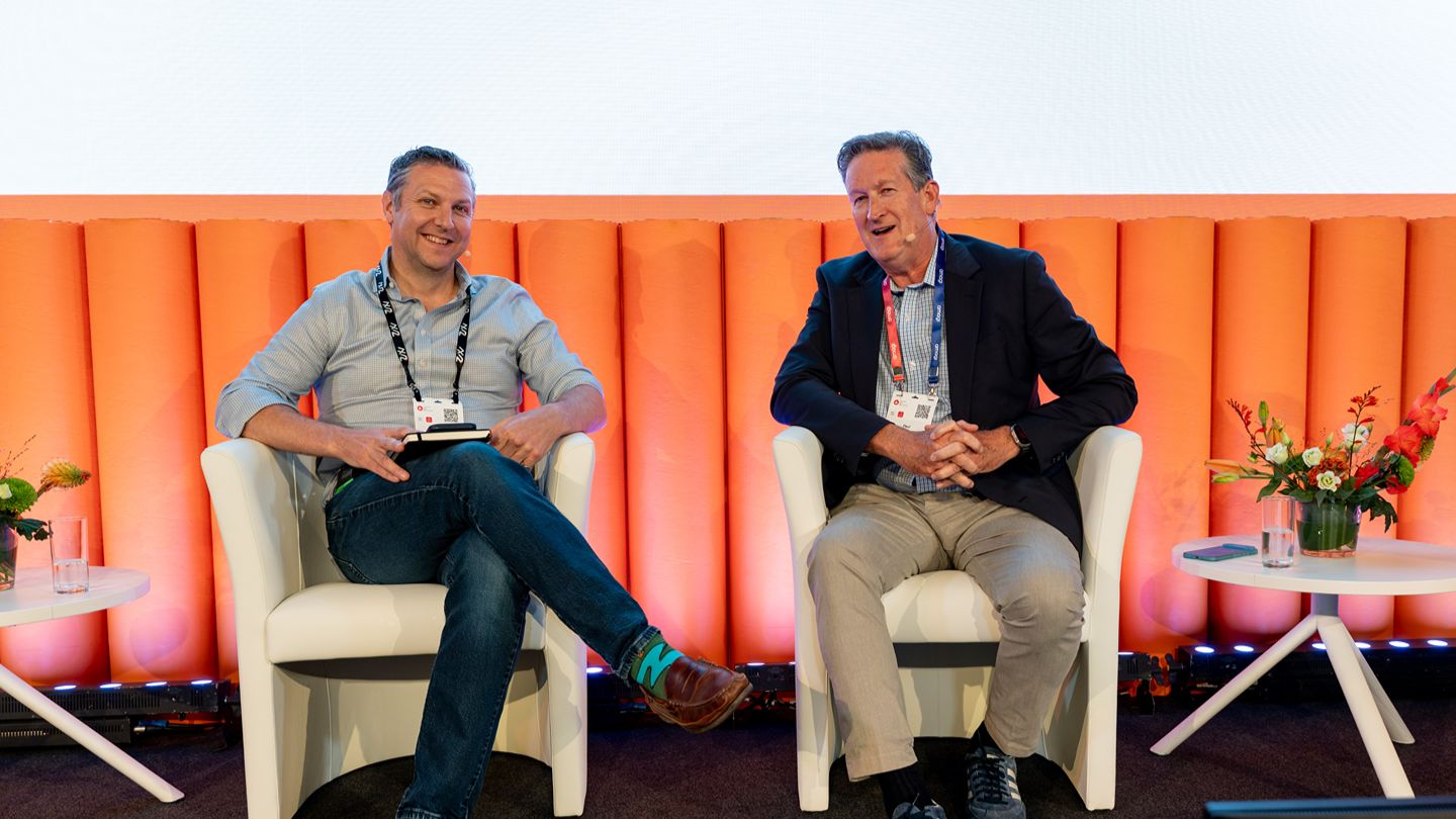 L-R: Jonathan Low, VP, Channel Sales, Partnerships, Zixi, in conversation with Paul Finster, VP, Business Development, Partnerships, Amagi. 	 